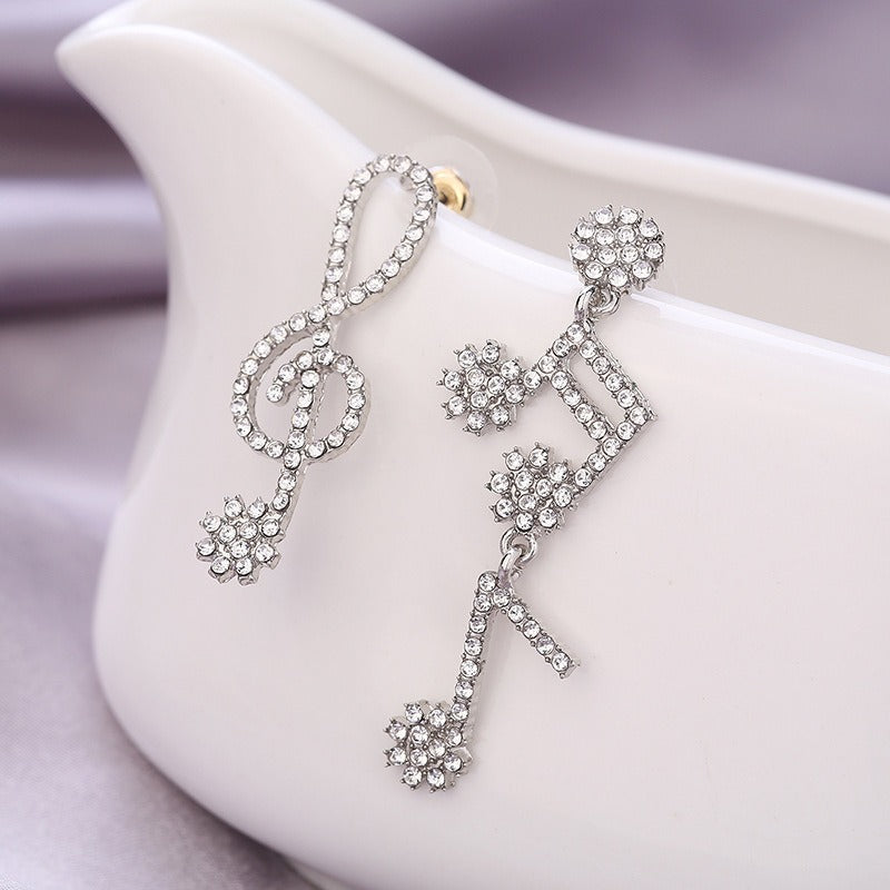 Silver needle inlaid with diamonds asymmetrical jumping notes earrings minimalist earrings